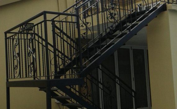 Structural Staircase with Iron Wrought Railing